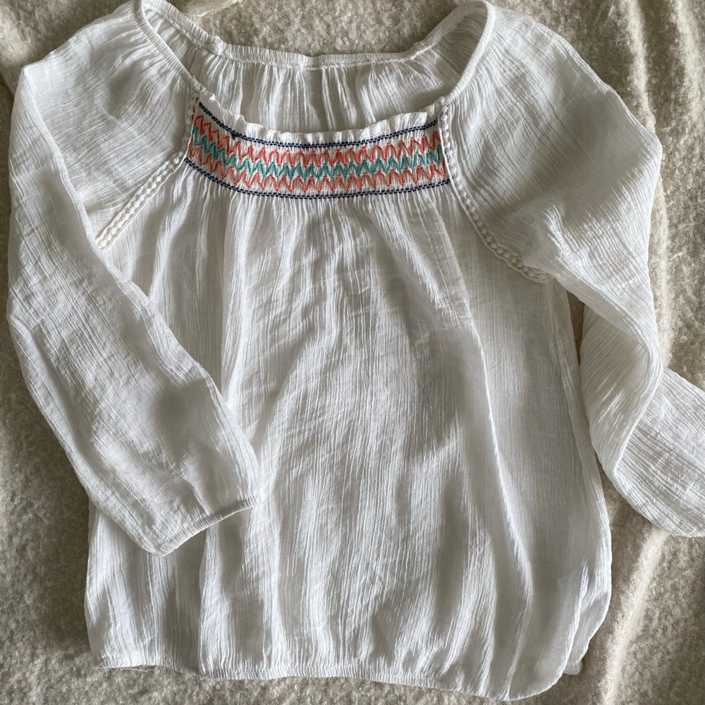 Elegant White Blouse with Lace Trim and Flowy Sleeves